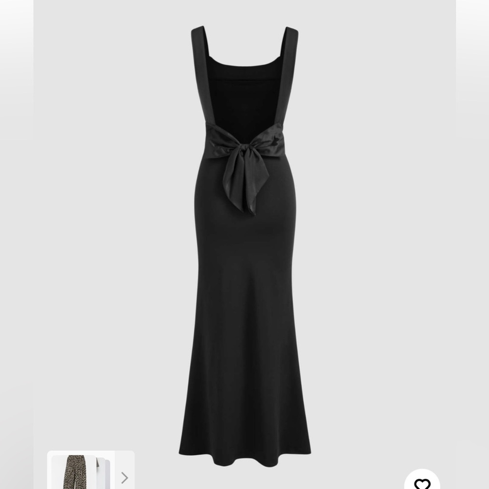 Cider Black Backless Dress with Bow Detail
Runs a little big. Never worn.